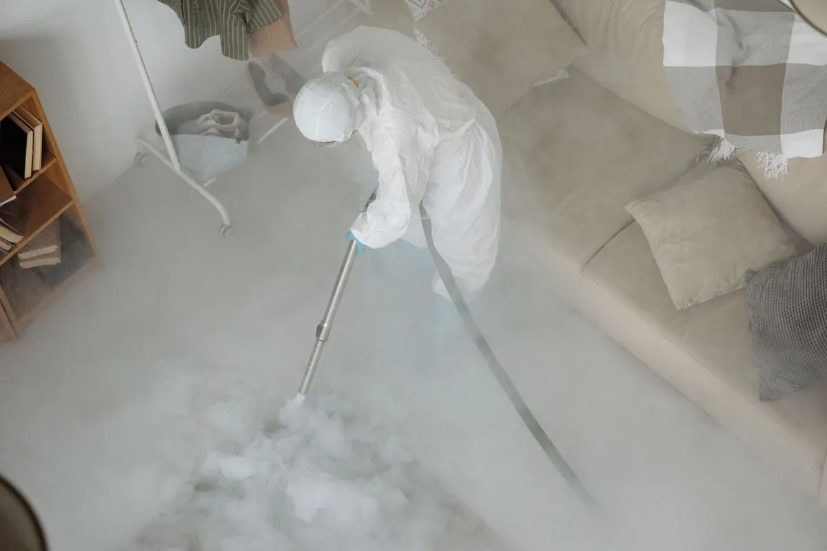 Biohazard cleanup technician in protective equipment, Balch Springs, TX